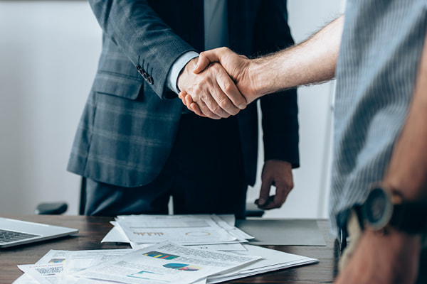 Business Finance deal - shaking hands